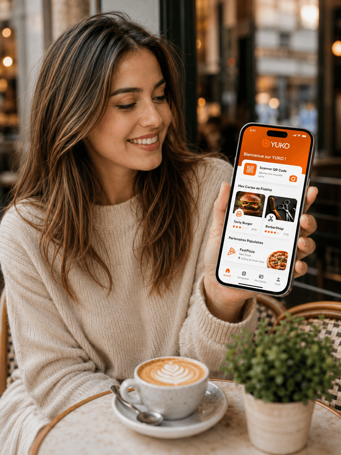 Cliente utilisant Yuko dans un café